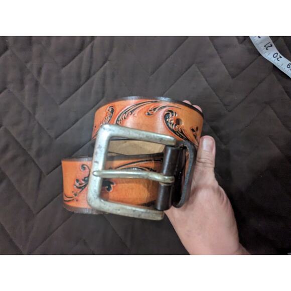 Women\'s light tan tooled leather belt w/silver hardware by Express size M (34\